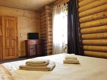 Фото номера Коттедж на улице Полтавской Курортные отели Eko resort Izki г. Изки 3